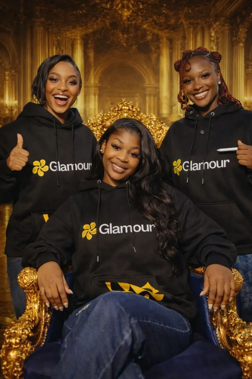 Three Glamour members in branded hoodies